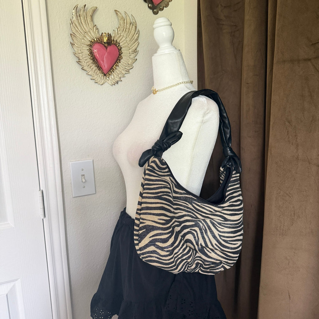 Medium Zebra Print Handbag with Knotted Black Handle