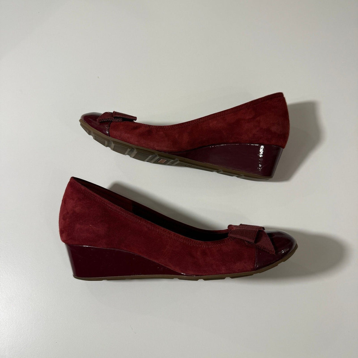 Cole Haan Burgundy Suede Wedge Heels with Bow Accent and Patent Toe Cap